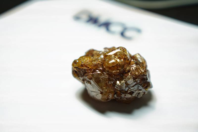 A rare 1,086-carat rough diamond was sold at a Dubai auction this week. The colour is the result of the stone being not one crystal, but several merged together. Some of them are darker than others and therefore give a yellow-orange glow. All photos: DMCC
