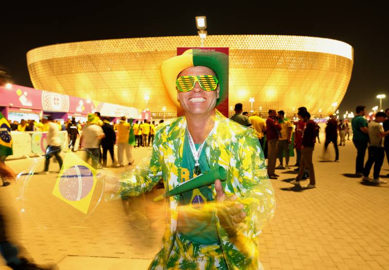 A fan of Brazil outside the Lusail Stadium in Lusail, before his team played Serbia. PA
