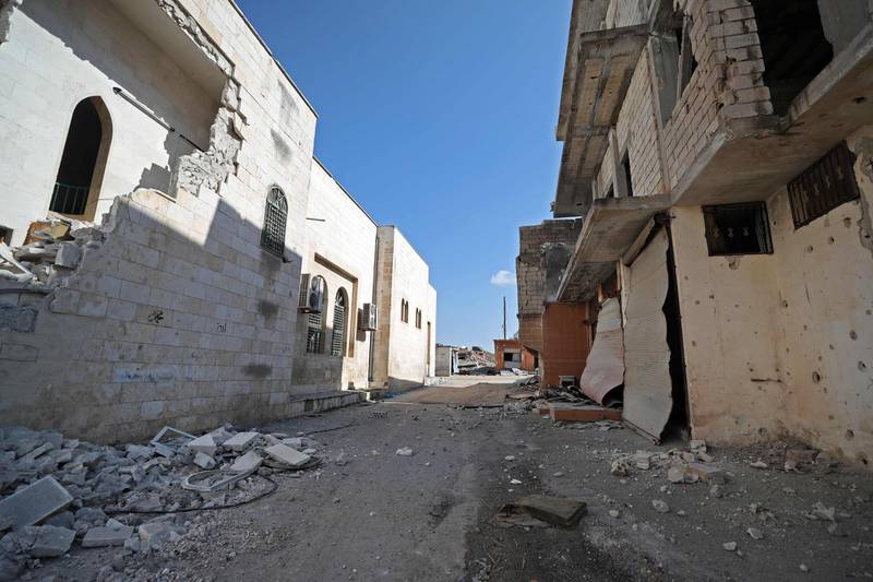Damaged homes in the village of al-Nayrab.