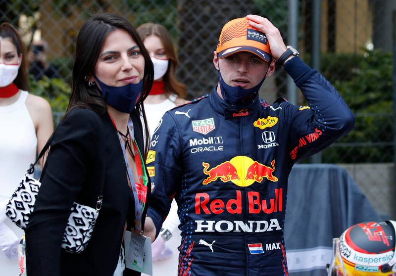 Red Bull's Max Verstappen celebrates winning the Monaco GP with partner Kelly Piquet. Reuters