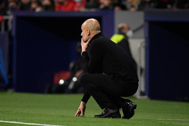 City coach Pep Guardiola watches from the touchline. AFP
