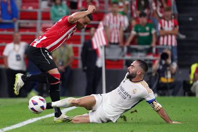 Athletic Bilbao midfielder Ander Herrera is tackled by Real Madrid defender Dani Carvajal. AFP