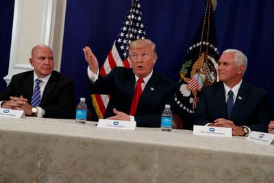 National Security Adviser H.R. McMaster, left, and Vice President Mike Pence listen as President Donald Trump speaks to reporters after a security briefing at Trump National Golf Club in Bedminster, N.J., Thursday, Aug. 10, 2017.  (AP Photo/Evan Vucci)