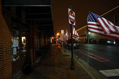 American Flags line the streets of Marietta  a day before the US midterm election in Georgia. Reuters