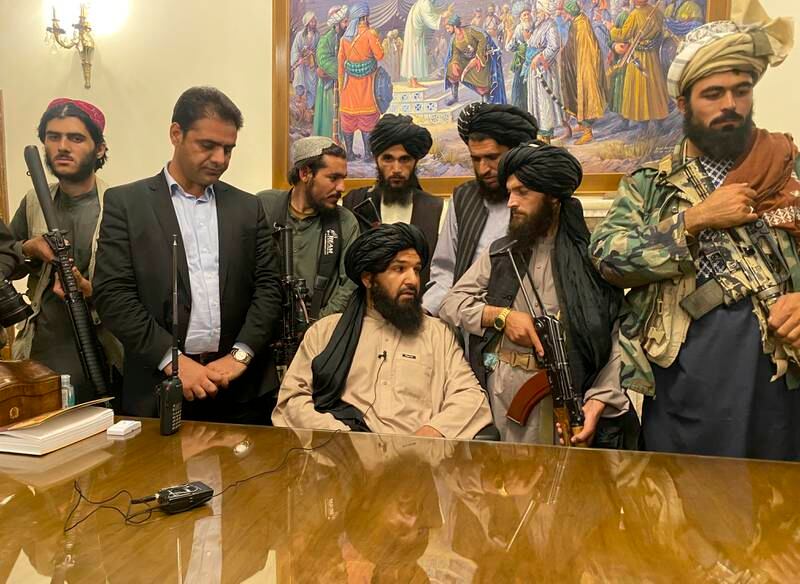 Taliban fighters take control of the Afghan presidential palace in Kabul after President Ashraf Ghani fled the country on Sunday.
