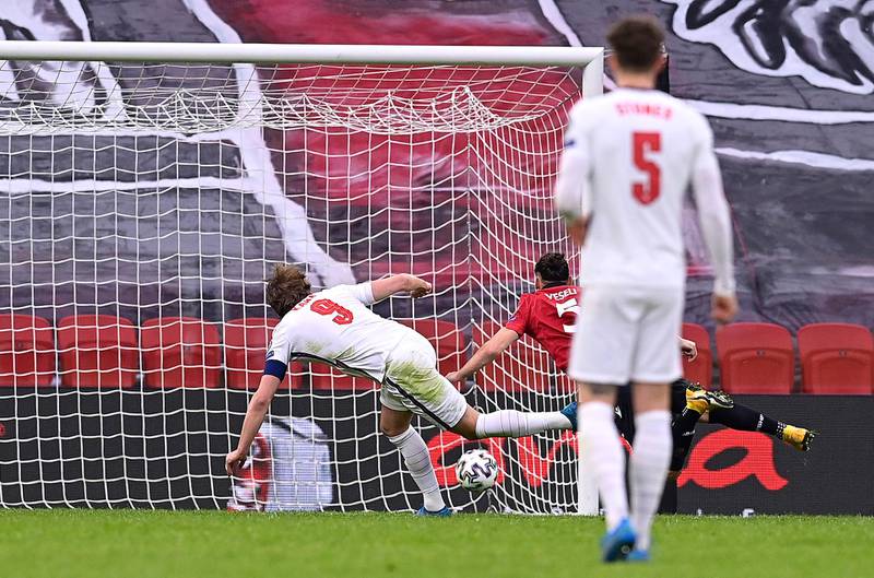 Harry Kane of England scores their side's first goal against Albania. Getty
