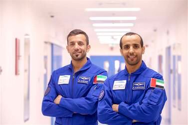 Maj Hazza Al Mansouri (right) and Dr Sultan Al Neyadi will learn how to do spacewalks at Nasa's facilities in Houston. Courtesy: Sheikh Mohammed bin Rashid's Twitter