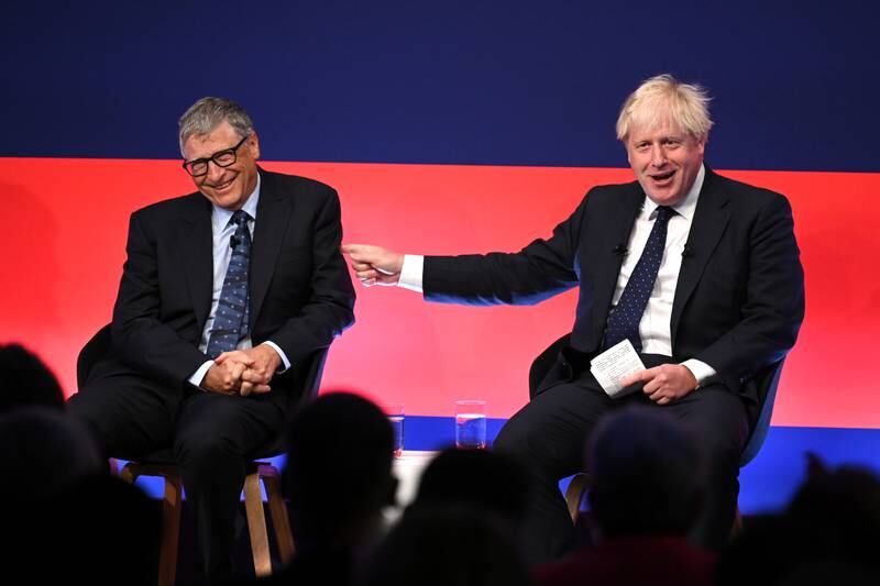 Britain's Prime Minister Boris Johnson appears on stage in conversation with Bill Gates during the Global Investment Summit at the Science Museum, London. Reuters