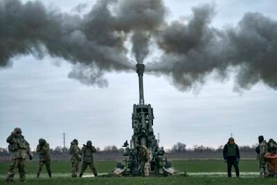 Ukrainian soldiers fire at Russian positions from a US-supplied M777 howitzer in Ukraine’s Kherson region in January. AP Photo