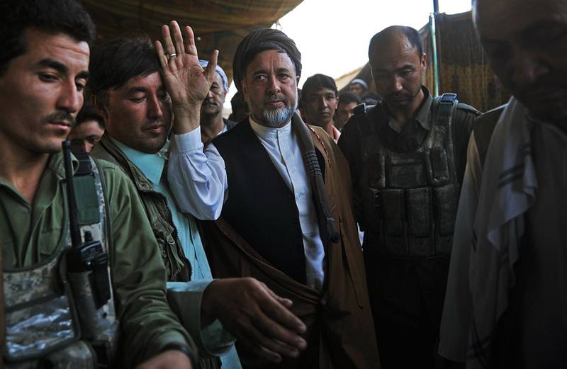 Muhammad Mohaqiq, centre, during an election campaign rally in 2010. AFP