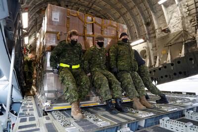 Lethal and non-lethal Ukrainian aid is loaded on to a plane bound for Poland by Canadian soldiers in Trenton, Ontario. Reuters