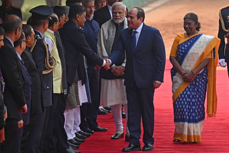 The leaders meet dignitaries at the ceremony at  Rashtrapati Bhavan presidential residence. AFP