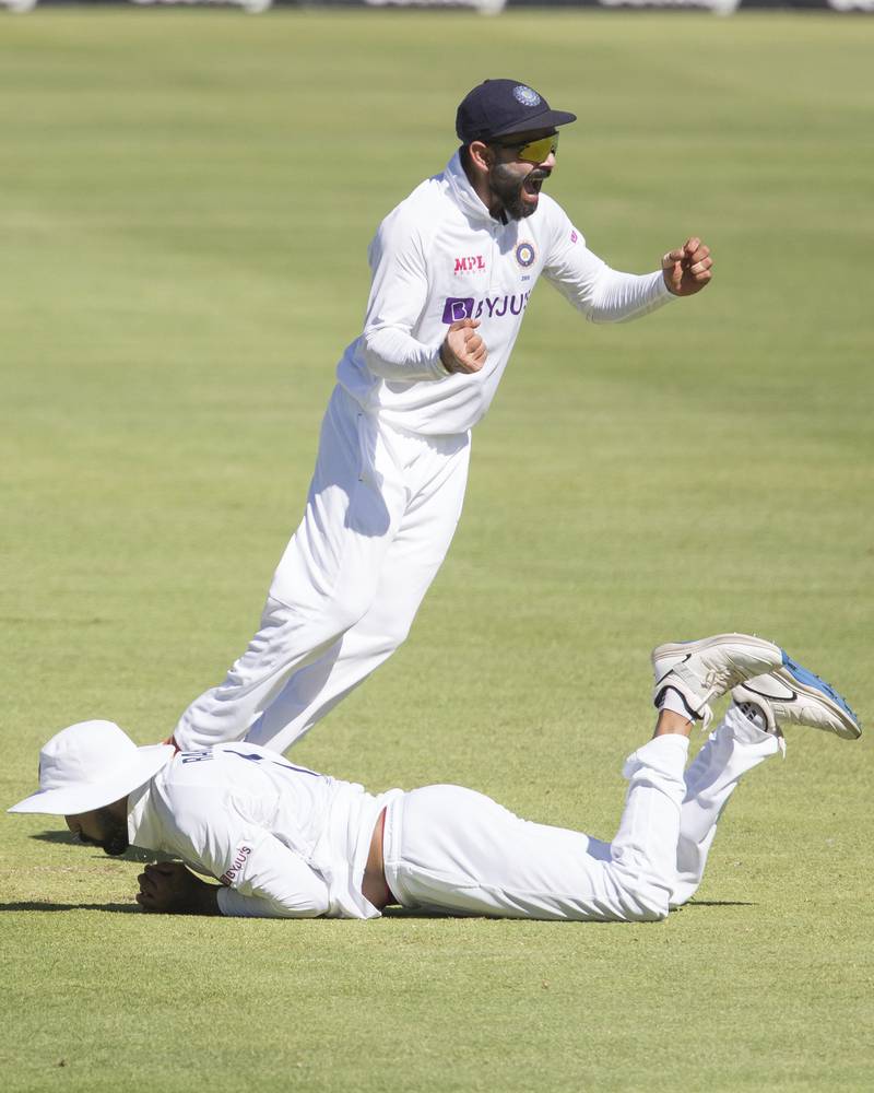 Virat Kohli celebrates after Kannur Rahul takes the wicket of Aiden Markram during the third Test match against South Africa. AP