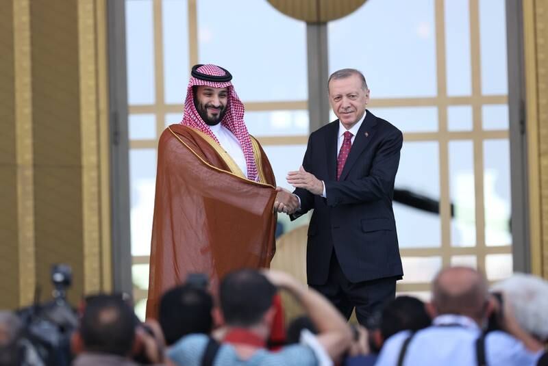 Turkish President Recep Tayyip Erdogan and Saudi Crown Prince Mohammed bin Salman pose for photographers before their meeting in Ankara. EPA 