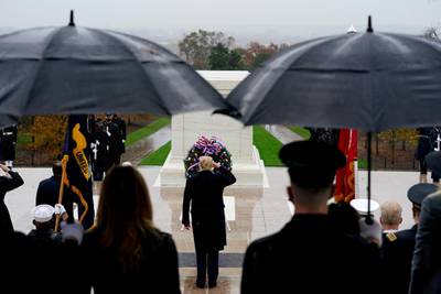 President Donald Trump participates in a wreath laying ceremony on Veterans Day at Arlington National Cemetery in Arlington.  AP