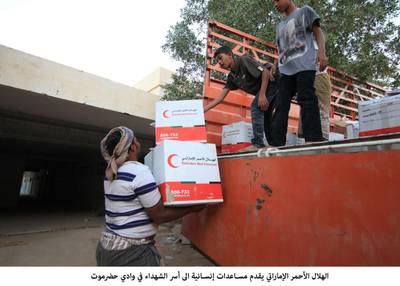 Emirates Red Crescent hands out humanitarian aid to families of martyrs in Hadramout in Yemen. Wam