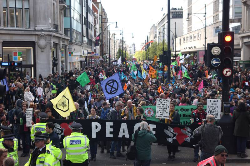 Extinction Rebellion protesters gather in Oxford Circus to begin their Spring 2022 UK Action. Getty.