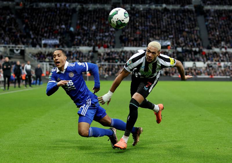 Newcastle's Joelinton in action with Leicester City's Youri Tielemans. Action Images