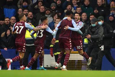 Aston Villa's Emiliano Buendia, right, celebrates scoring against Everton. PA