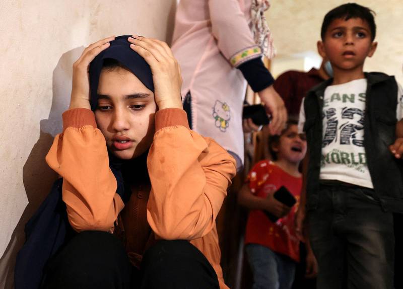 Relatives of Palestinian Hussien Hamad, 11, mourn during his funeral in Beit Hanoun, Gaza. AFP