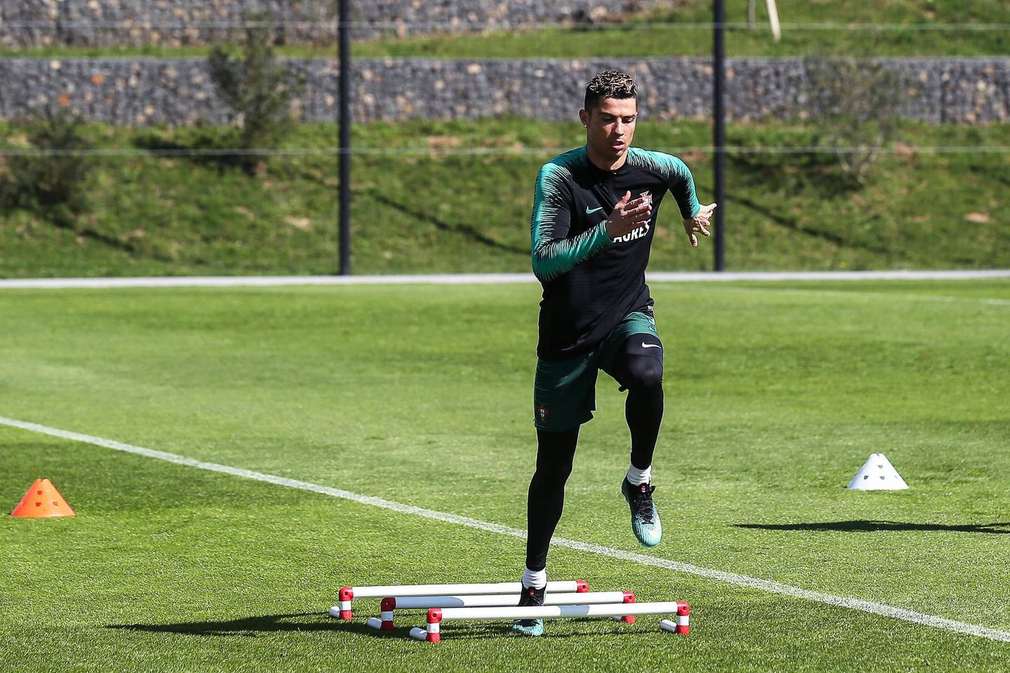epa06620067 Portuguese national soccer team striker Cristiano Ronaldo performs during his team's training session at Cidade do Futebol in Oeiras, near Lisbon, Portugal, 22 March 2018. Portugal will face Egypt on 23 March and the Netherlands on 26 March 2018 in their upcoming International Friendly matches.  EPA/ANTONIO COTRIM