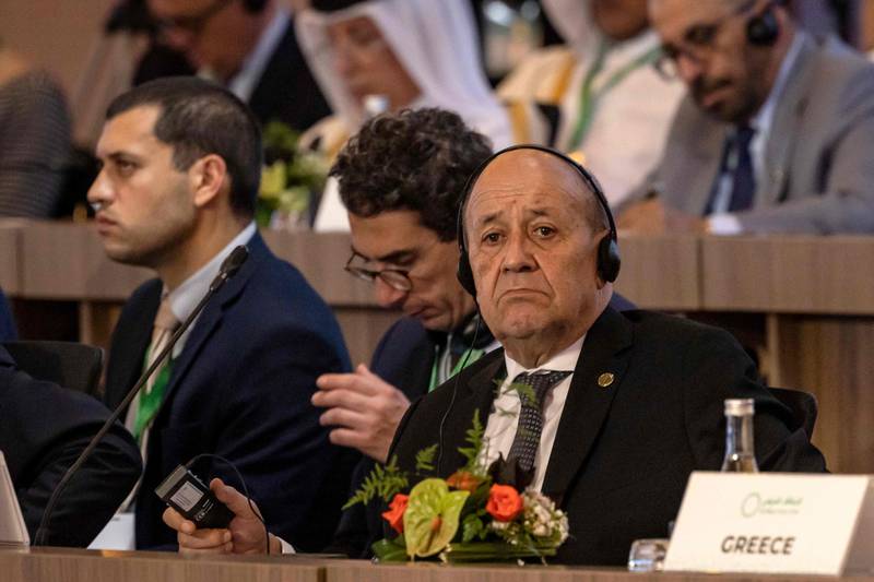French Foreign Minister Jean-Yves Le Drian listens to delegates. AFP