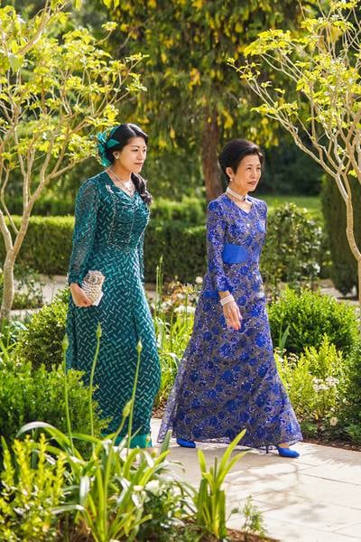 Japanese Princess Takamado, right, and her daughter Princess Tsuguko, representing Emperor Naruhito, arrive at the venue of the wedding. Reuters