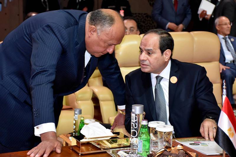 Egyptian President Abdel Fattah El Sisi (R) speaks with Egyptian Foreign Minister Sameh Shoukry during the 29th Arab Summit, in Dhahran, Saudi Arabia, on April 15, 2018. EPA