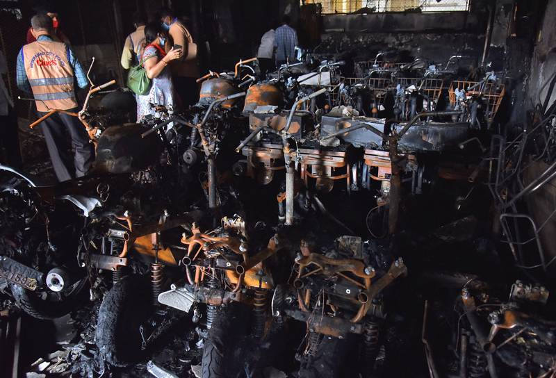 Burnt-out scooters in the showroom in Secunderabad after the fire on Tuesday. Reuters