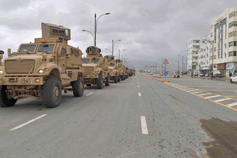 Military personnel monitor the streets on Friday in heavy-duty vehicles. 