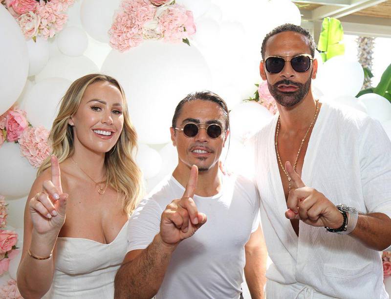 Kate Wright and Rio Ferdinand pose with Nusret Gokce at their pre-wedding brunch. Instagram / Kate Wright