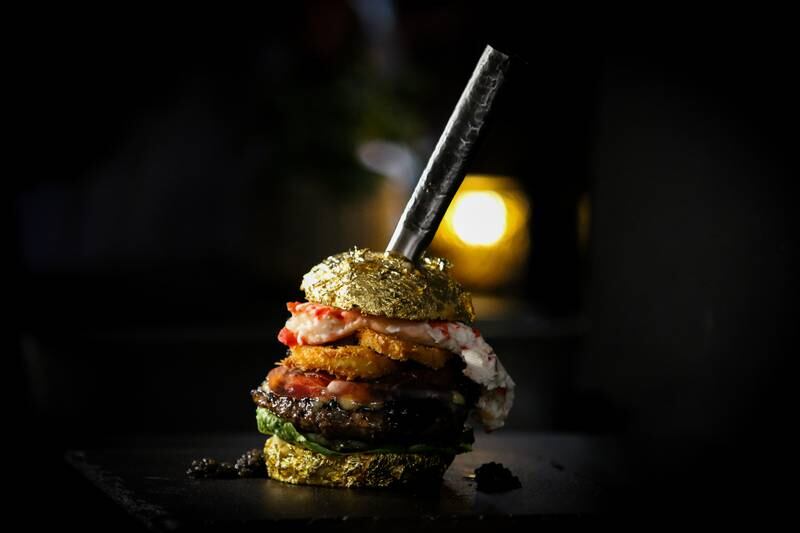 The bun in the Golden Boy burger is covered in gold leaf. Courtesy De Daltons