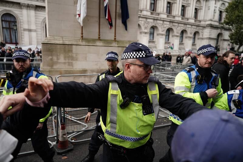 Police guarded the Cenotaph as pro-Palestinian protesters marched past during last weekend's rally. PA 