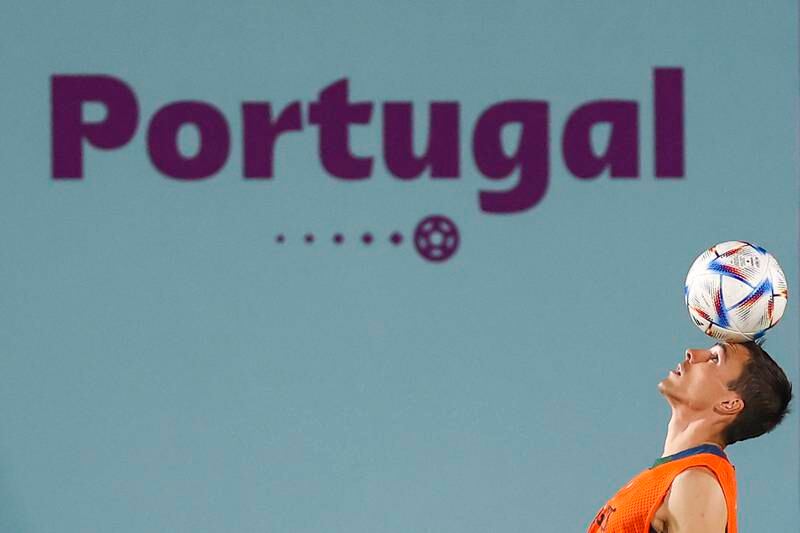 Portugal's Joao Palhinha balances the ball. EPA