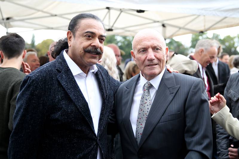 Shahid Khan with former Fulham star George Cohen. PA