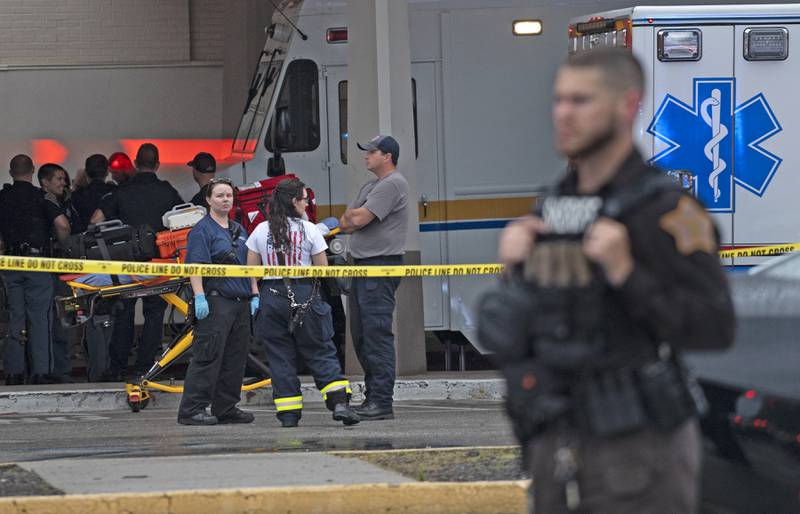 Emergency personnel gather after a deadly shooting at a mall in Greenwood, a town near Indianapolis. AP