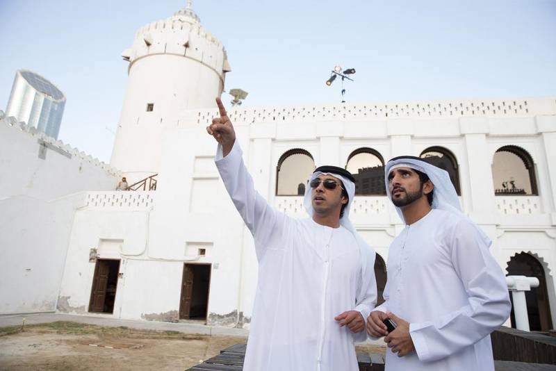 Sheikh Mansour bin Zayed, Deputy Prime Minister and Minister of Presidential Affairs, left, and Sheikh Hamdan bin Mohammed, Crown Prince of Dubai, right, tour the fort during the Qasr Al Hosn Festival. Silvia Razgova / Crown Prince Court - Abu Dhabi