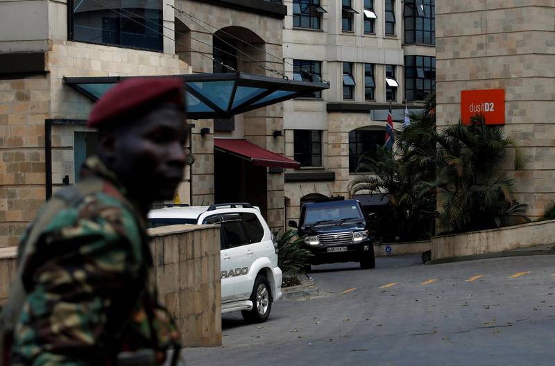 A vehicle is seen as a member of the security forces keeps a look out. Thomas Mukoya / Reuters