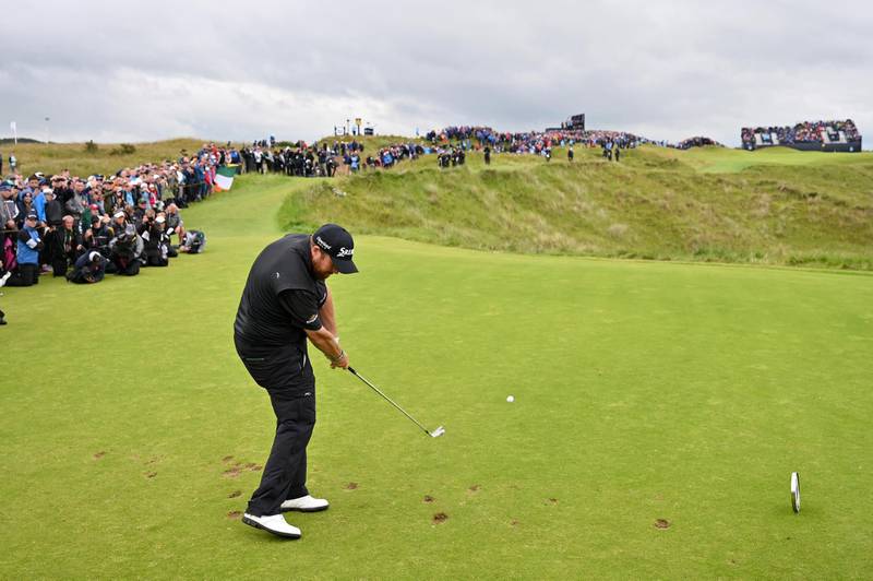 Lowry plays his shot on the 16th tee. Getty Images
