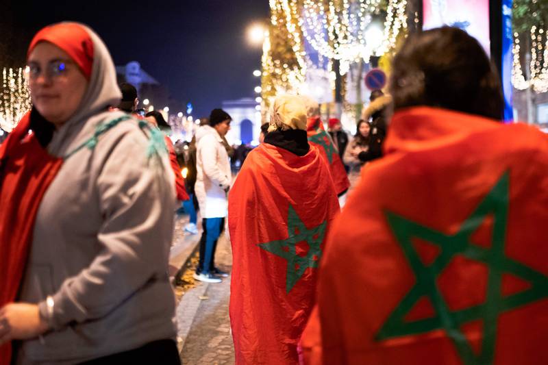 The green star of Morocco is displayed on flags draped around proud fans' shoulders. AFP