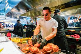 Nusret Gokce cooks at the first Saltbae Burger in an airport, in Turkey. Photo: Istanbul Airport