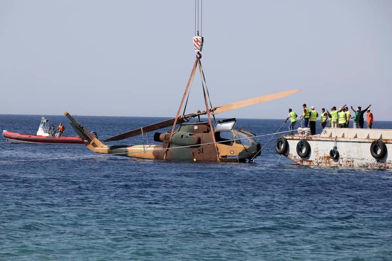 A helicopter being lowered into the Red Sea. Reuters