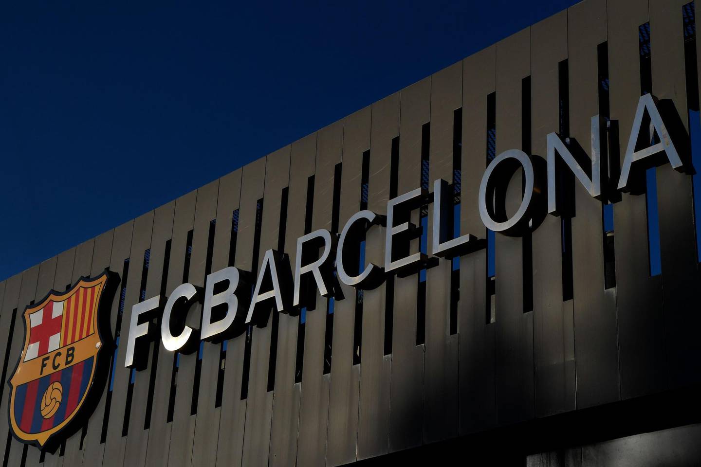 Picture shows a exterior view of the Camp Nou stadium in Barcelona on September 4, 2020. Lionel Messi confirmed today he will stay at Barcelona, insisting he could never go to court against "the club of his life". Messi released a statement at 6pm CET, saying "I would never go to court against Barca because it is the club that I love, that gave me everything since I arrived, it is the club of my life, I have made my life here." / AFP / Pau BARRENA
