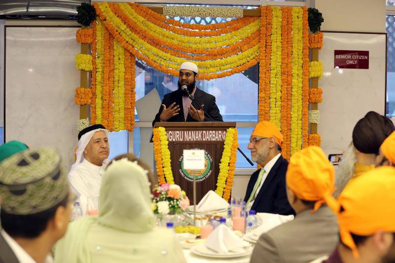 Dubai, United Arab Emirates - May 15, 2019: People take part in a multi faith Iftar at Gurunanak Darbar Sikh Gurudwara. Wednesday the 15th of May 2019. Jebel Ali, Dubai. Chris Whiteoak / The National