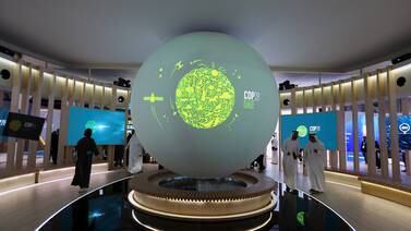 A view shows the 'Cop28 UAE' logo on a globe, during Abu Dhabi Sustainability Week (ADSW), in Abu Dhabi, UAE, January 17, 2023.  REUTERS / Rula Rouhana
