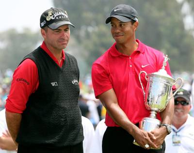 SAN DIEGO - JUNE 16:  Tiger Woods stands with runner-up Rocco Mediate after winning on the first sudden death playoff hole during the playoff round of the 108th U.S. Open at the Torrey Pines Golf Course (South Course) on June 16, 2008 in San Diego, California.  (Photo by Ross Kinnaird/Getty Images)