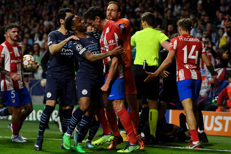 Players scrap during the Champions League quarter-final at the Wanda Metropolitano. AFP