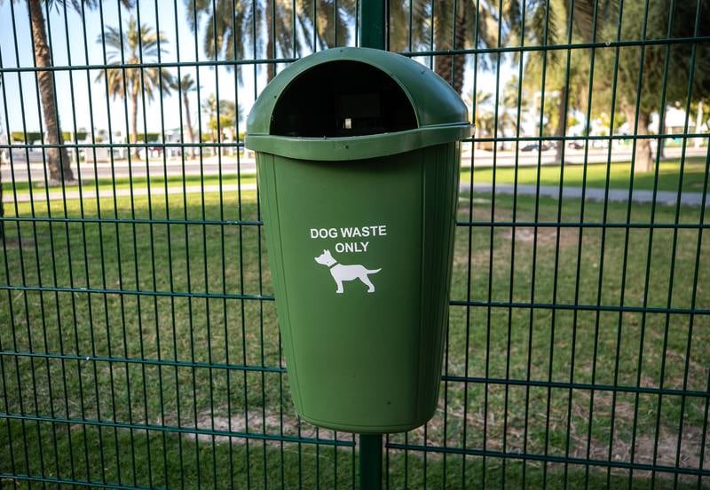 There are bins for dog waste dotted around the park.