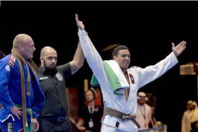 Faisal Al Ketbi, right, produced another golden moment for the UAE at the Abu Dhabi  World Professional Jiu-Jitsu Championships.
