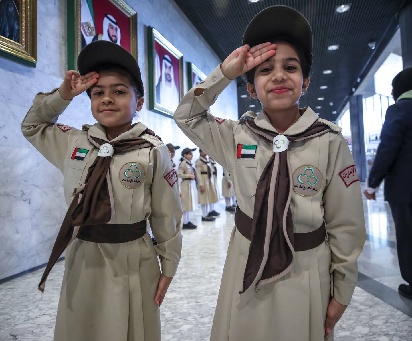 Nouf Abdul Salam, 9, and Wufa Ahmed, 9, welcomed guests to the 23rd Arab Regional Conference. Victor Bessa/The National